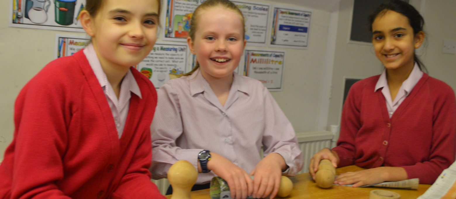 3 students in a baking session