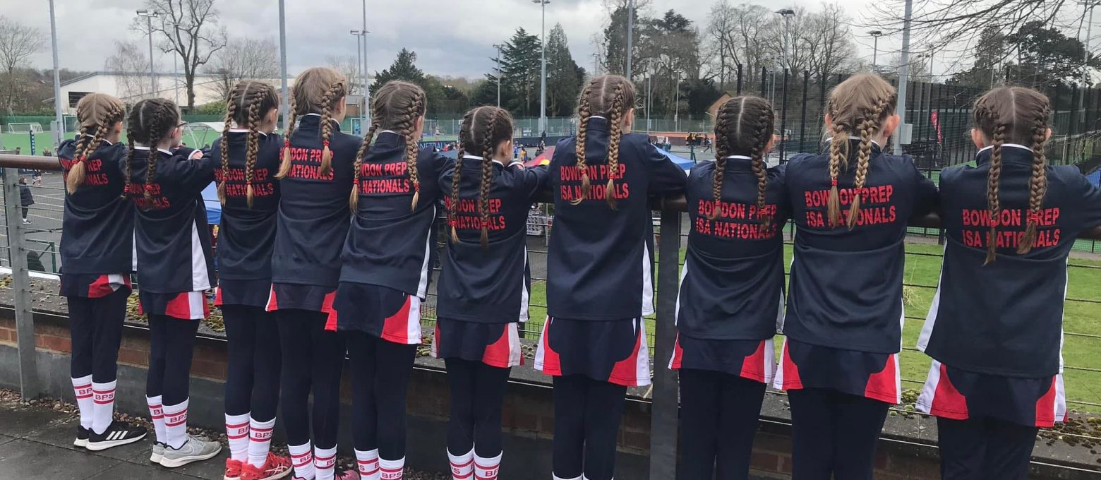 girls standing in a line in uniform