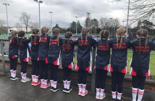 girls standing in a line in uniform