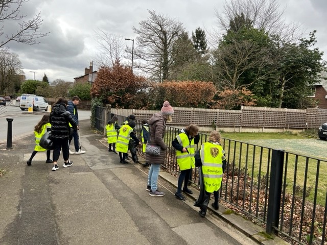 young children on a litter pick