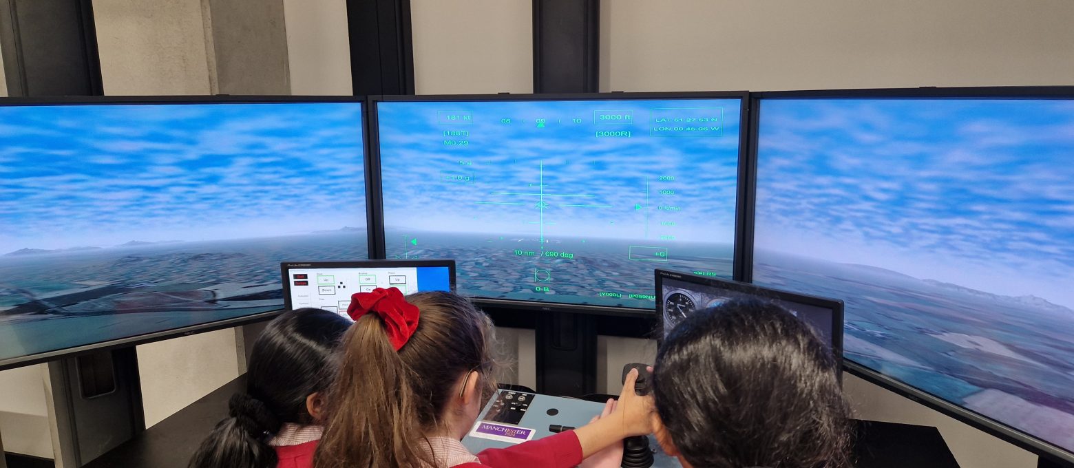 children in a flight simulator