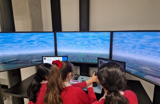 children in a flight simulator