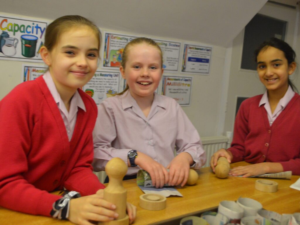 3 students in a baking session