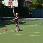 student throwing a ball