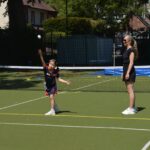 student throwing a ball