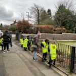 young children on a litter pick