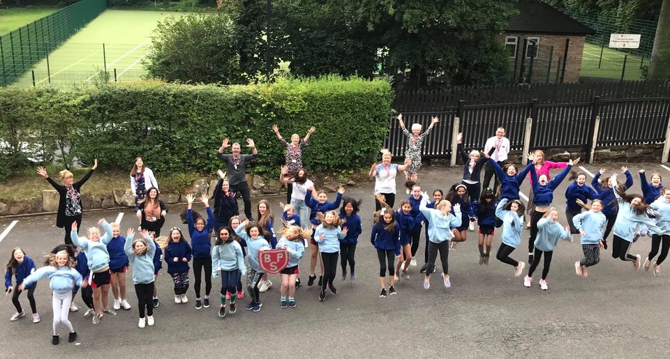 students jumping