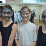 students with face paint